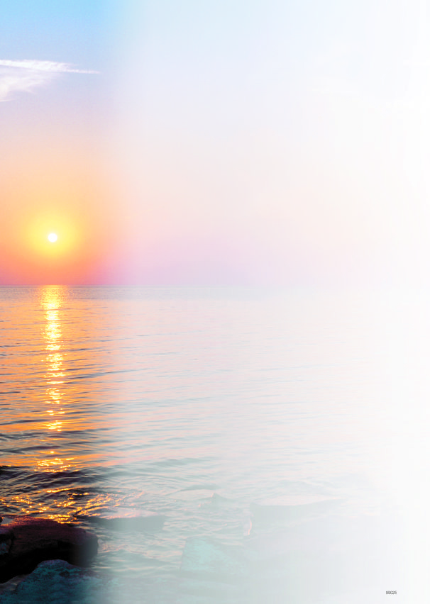 Trauerbrief mit Foto eines Sonnenuntergangs über dem Meer