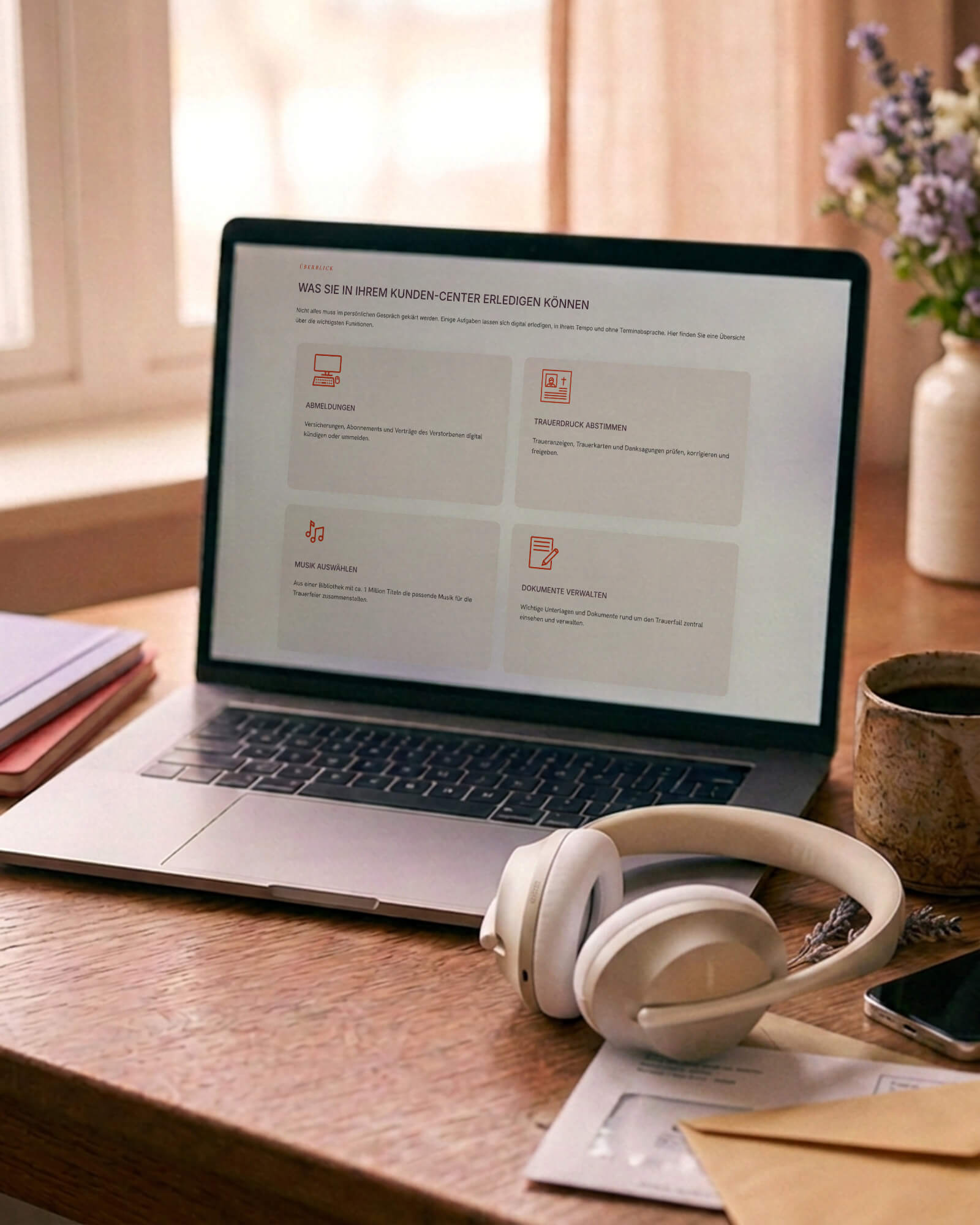 Laptop mit Kopfhörer, über das Kunden-Center wird die Musik für die Trauerfeier ausgewählt